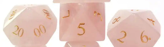 Pink crystal gemstone dice
